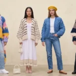 a group of diverse women (4 models) styled in different types of cardigans as described in the article, minimalist studio setting with soft neutral background (#F5F2ED), warm natural lighting, luxury magazine aesthetic, highly detailed knit textures, clean composition. Each woman represents a different cardigan style: one wearing a chunky knit cardigan over a simple white tee and straight-leg jeans (winter cozy look) one wearing a long cardigan layered over a midi dress with ankle boots (elegant flowy silhouette) one wearing a crochet cardigan over a summer dress (light airy summer styling) one wearing a cropped cardigan styled as a top with high-waisted trousers (modern chic look) one wearing a classic button-up fitted cardigan with tailored trousers (smart office style)